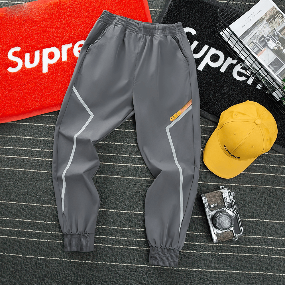 Quick-drying Sports Pants for Boys with Side Pockets - SF3619, gray design with elastic waist and stylish side detailing on display.